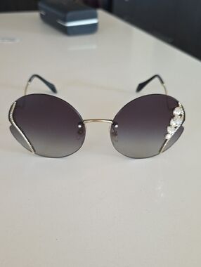 Miu Miu Gold Frame Funky Round Sunglasses with Dark Gradient Lenses and Crystal